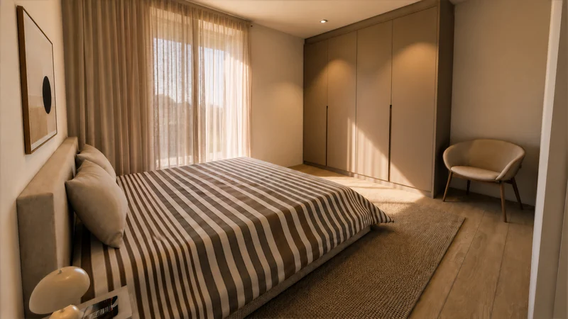 Chambre avec armoire intégrée et fauteuil